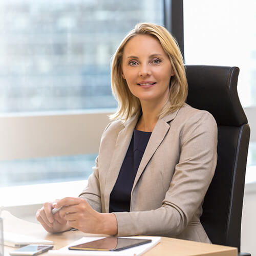 Female executive sitting at desk